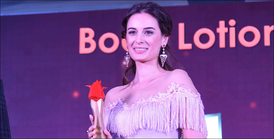 Evelyn Sharma is radiant as she accepts her award