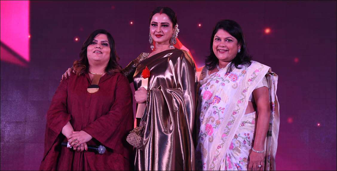 Founder and CEO, Nykaa.com, Falguni Nayar and Chief Community Officer and Editor, Femina, Tanya Chaitanya awards Rehka the Legendary Style Diva Award