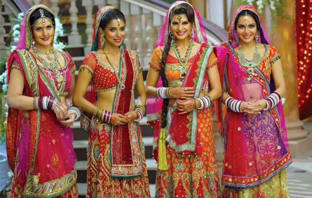 A PORTRAIT OF A GUJARATI Bride dressed in traditional SAREE CALLED 