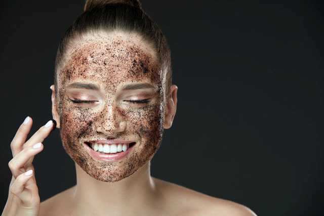 woman exfoliating