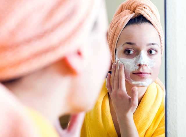 woman exfoliating