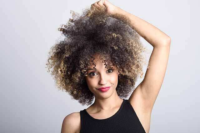 Sporty Hairstyles For Curly Hair · East Oakland Sports Center