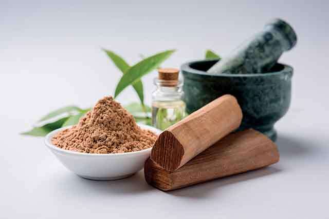 Glowing facial massage with sandalwood