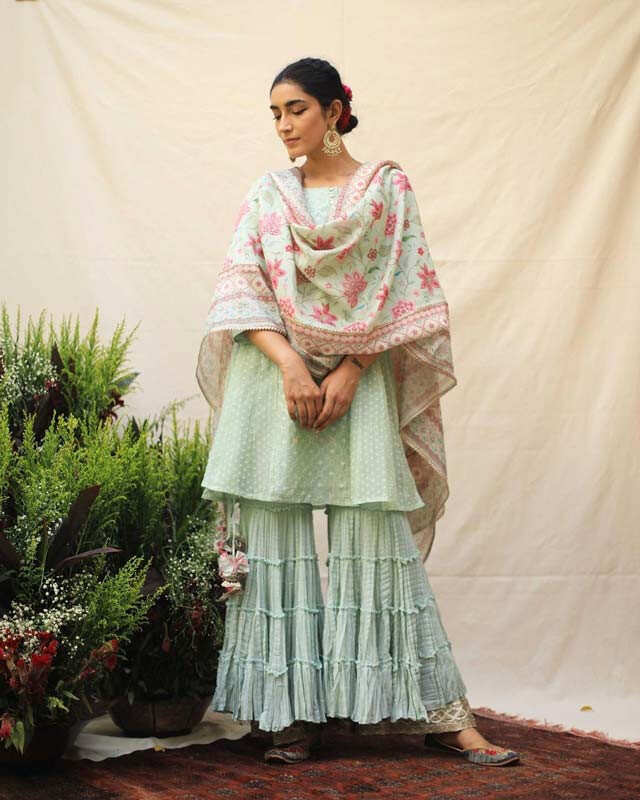 Jamdani embroidered short kurta paired with mulmul sharara and chanderi dupatta by The Neh Store