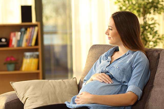 https://www.123rf.com/photo_117942008_pregnent-woman-thinking-looking-away-sitting-on-a-couch-in-the-living-room-at-home.html?downloaded=1