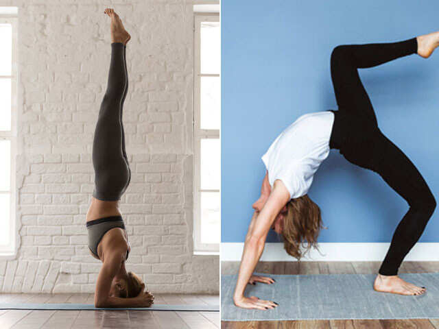 Woman does a head stand yoga pose - Stock Image - Everypixel