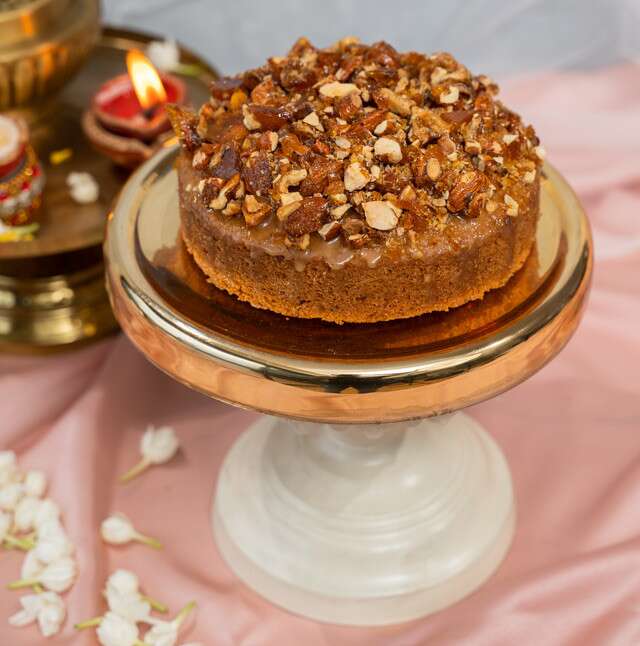 Buy Almond Praline Cake online from Ek Om Jeets Creations
