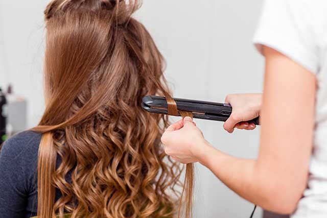 How to curl hair with a 2025 straightener at home