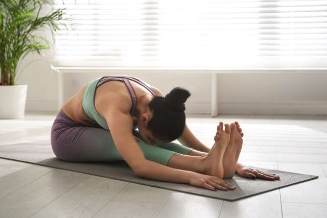 Paschimottanasana or Forward Bend Pose Yoga for Heartburn