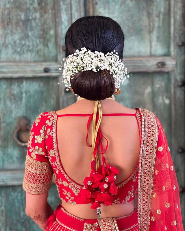 Penteados chignon para noivas indianas