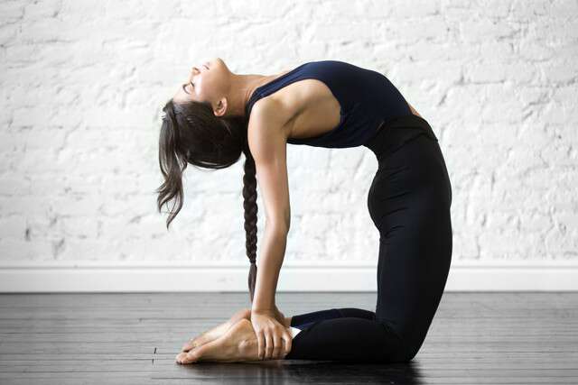This Yin Yoga Sequence Will Stretch & Soothe Your Tight Shoulders