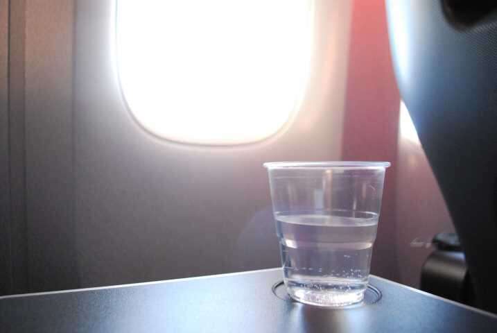 make flying less painful - drink only water on flights