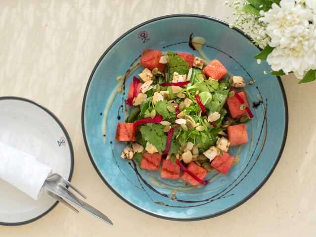 Summer salads in Delhi - smokehouse deli - Melon + feta + arugula salad