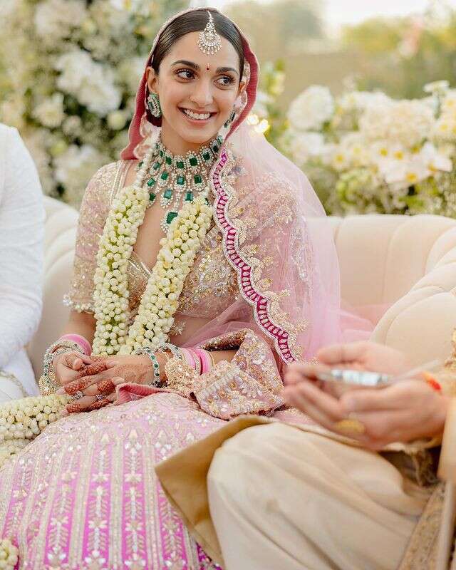 Sara Ali Khan's rani pink Punit Balana lehenga with asymmetrical blouse is  perfect for a summer wedding. Pics - India Today