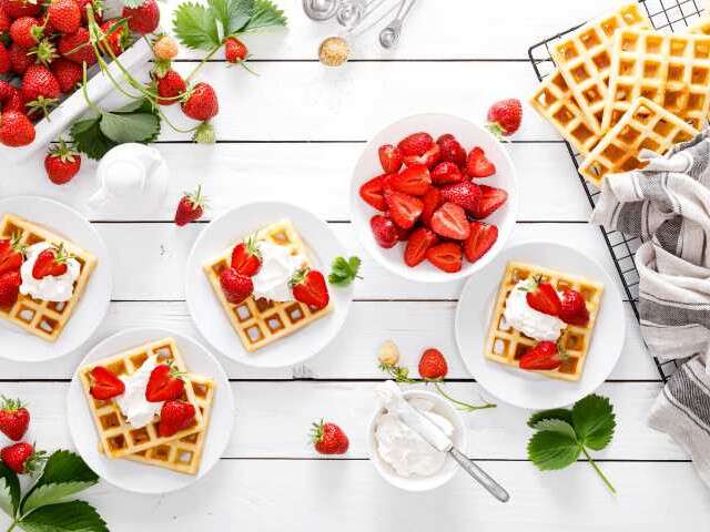 interesting waffle toppings - strawberries and whipped cream