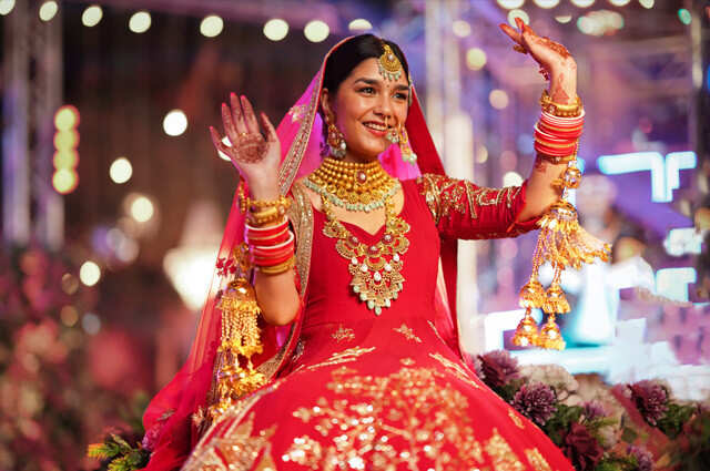 Graceful Grandeur - Bridal Red Lehenga with traditional Indian Polki  Jewellery adorned with Pearls, Gold and Rubies. For me personally… |  Instagram