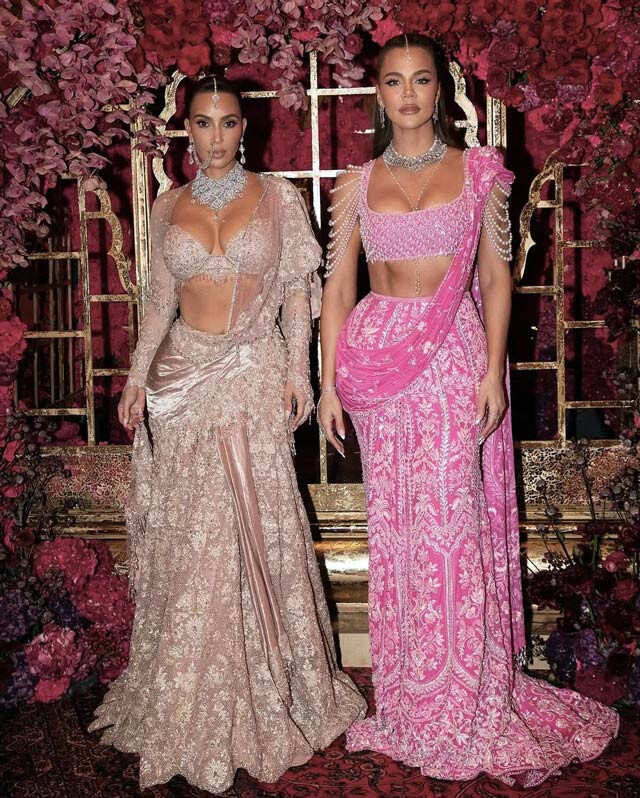 Kim and Khloe Kardashian in Tarun Tahiliani and Manish Malhotra