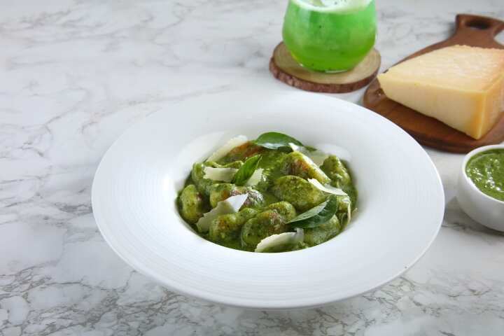 Bluebop Cafe's Pesto Gnocchi is perfect to get your fix on World Pasta Day