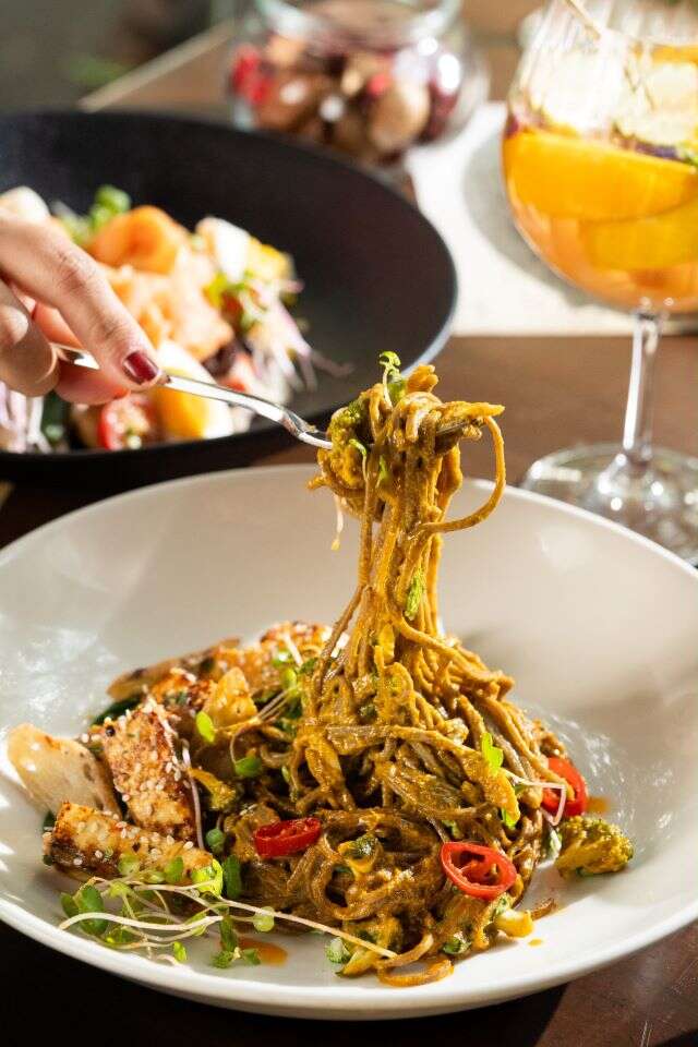 Silver Beach Cafe's Sweet chickpea miso cottage steak with Yaki Soba is perfect to get your fix on World Pasta Day