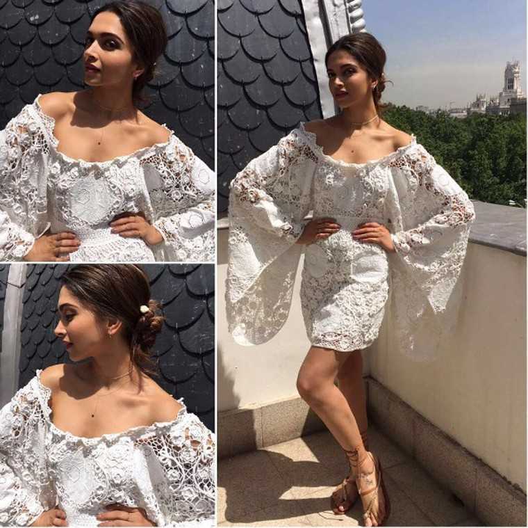 DEEPIKA PADUKONE In virginal white lace, this Chloe dress is perfect for summer holidays in Europe. The balance of the exposed shoulders and short hemline with the oversized sleeves keep it from looking too bridal.