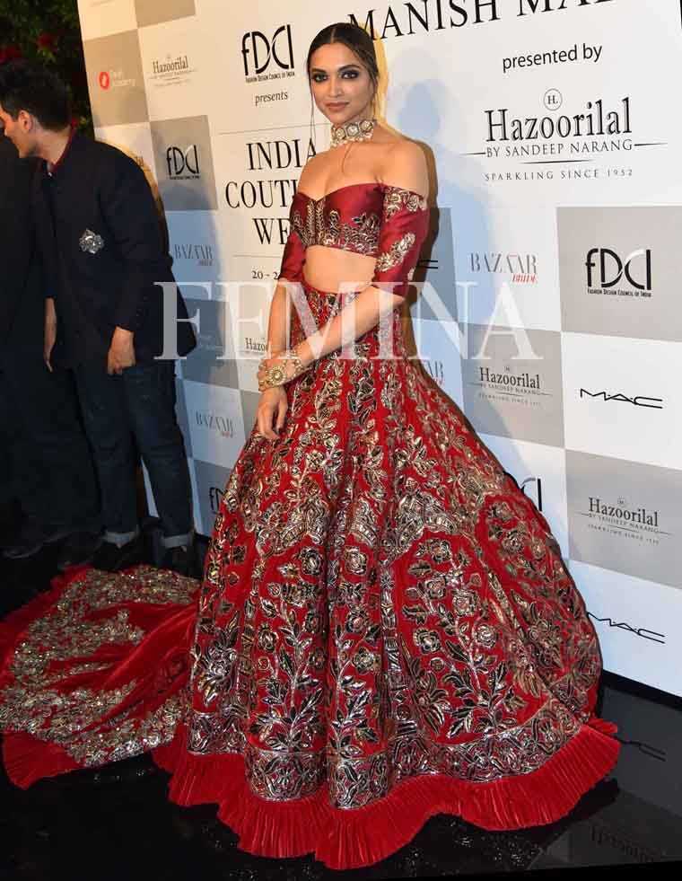 Deepika Padukone @ Manish Malhotra:  Deepika closed Manish Malhotra’s show in an embellished off-shoulder ensemble from the designer’s collection titled A Persian Story.