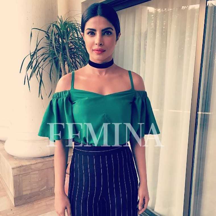 PRIYANKA CHOPRA Her clavicle-bearing, off-shoulder top from Shift by Nimish Shah is the natural pairing for a broad Intrinsic velvet choker. The two on-trend pieces work together to highlight a slim neckline.