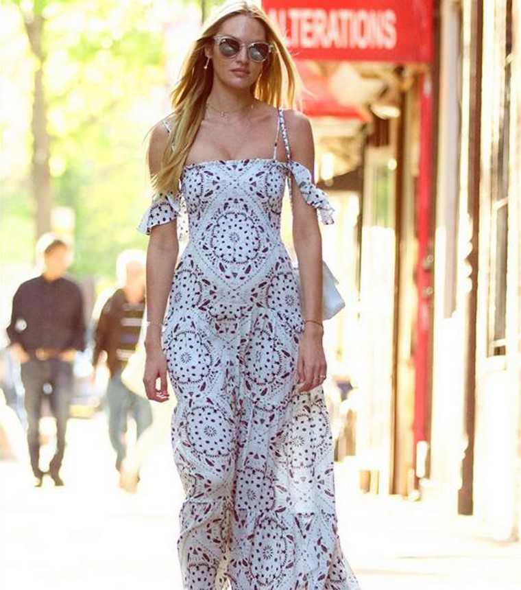 Victoria’s Secret model Candice Swanepoel in a printed maxi dress by Jen’s Pirate Booty