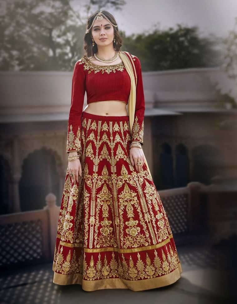 This gorgeous bridal lehenga in the shade of blood red is densely and  intricately embroidered at the bottom and the blouse yet allowing the… |  Instagram
