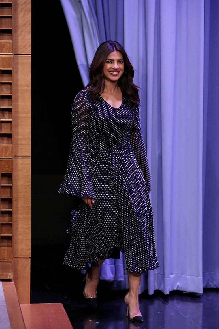 For her second appearance on Tonight’s Show with Jimmy Fallon, Peecee chose a polka dotted midi dress and a pair of pointy-toe Gianvito Rossi pumps.