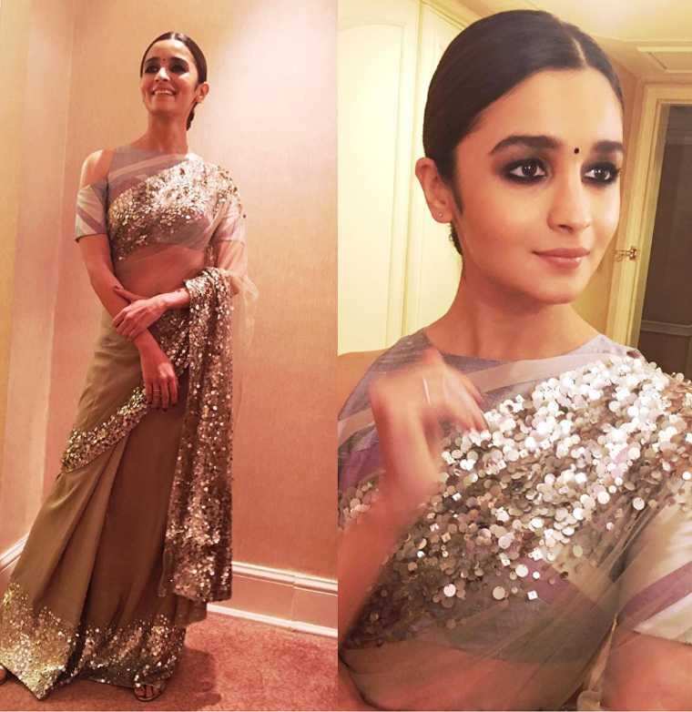 BollywoodShaadis.com - Alia Bhatt is known for her adorable fashion picks.  Recently, for her friend's wedding, she opted for a gorgeous yellow-toned  saree. #aliabhatt #aliabhattfan #alia #rahakapoor #ranbirkapoor  #weddinglook #saree #wedding |