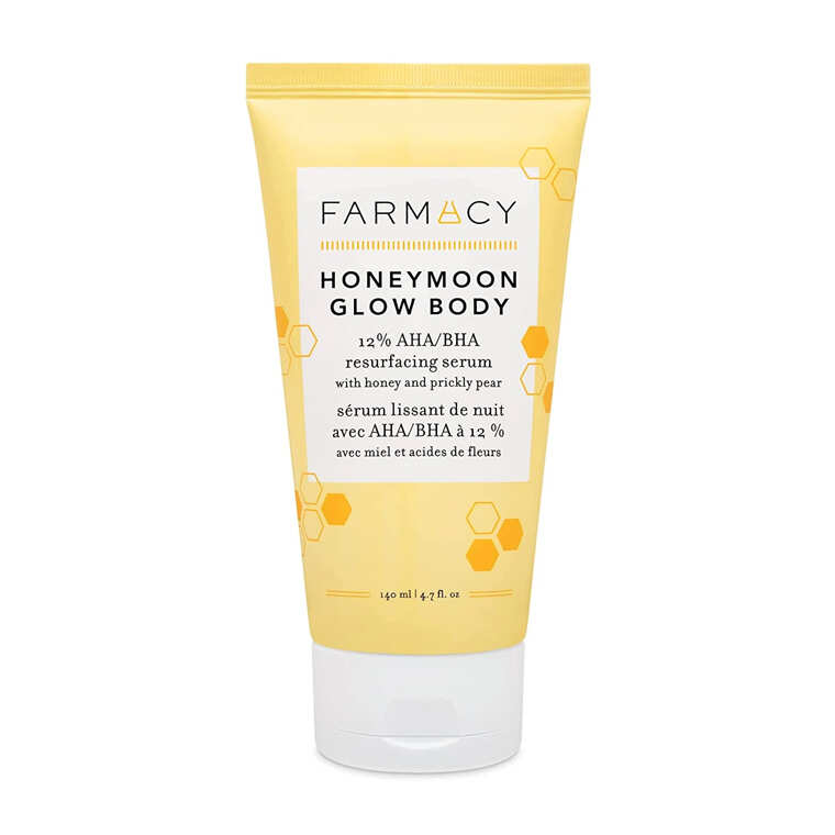 Farmacy Honeymoon Glow Body Serum gently resurfaces skin with AHA and BHA, improving radiance, texture, and overall skin clar