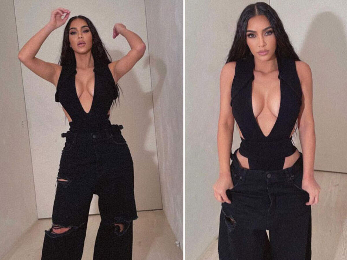 Kim Kardashian wears a Maximilian Spring 2022 bonded scuba bodysuit and  paired it with black ripped baggy jeans, more than likely Balenci