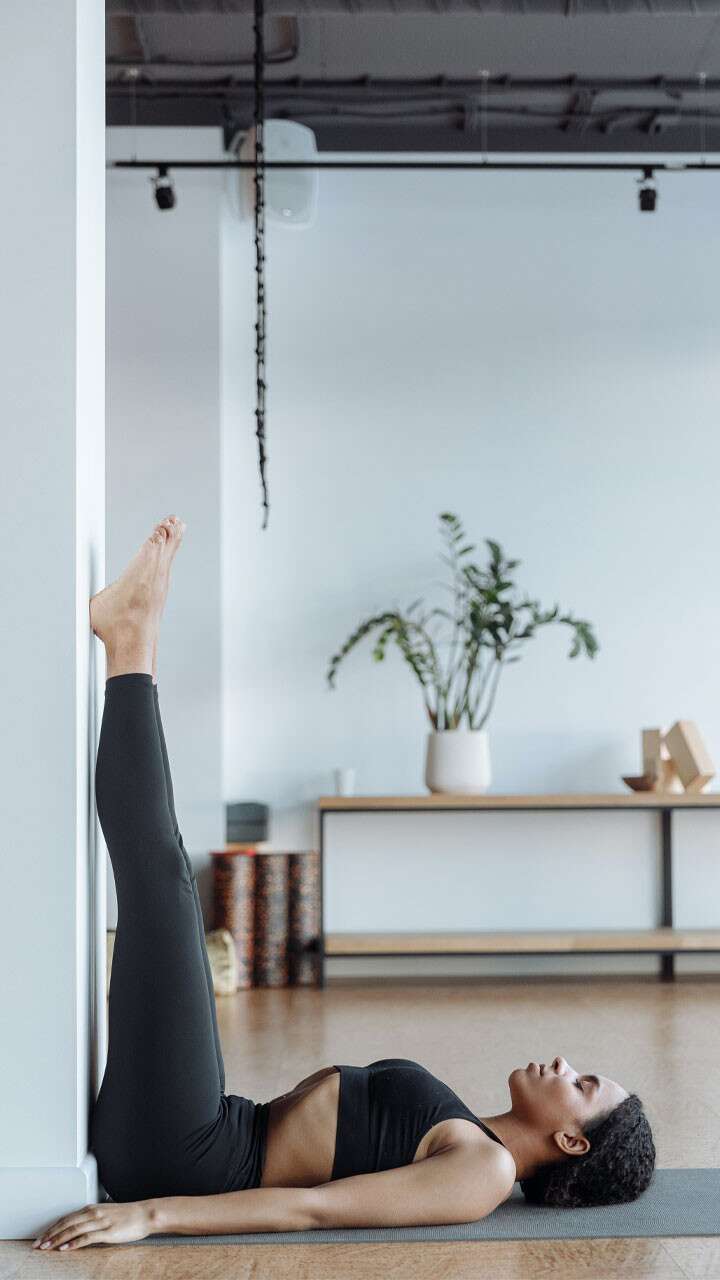 Viparita Karani (Legs Up the Wall Pose) is the mother of all restorative  poses. It can be helpful for insomni… | Legs up the wall, Wall yoga,  Restorative yoga poses